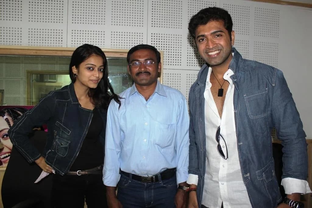 P. Vijayakumar with celebrity guests inside a broadcast studio